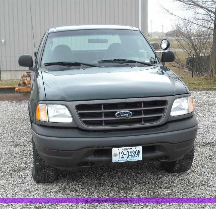 image for item 3279 2003 Ford F150 four door extended cab pickup