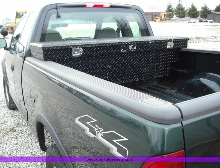 image for item 3279 2003 Ford F150 four door extended cab pickup