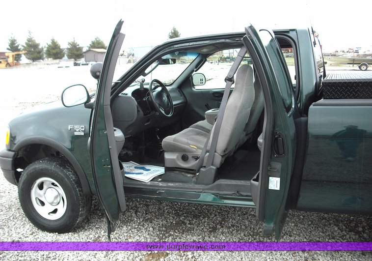 image for item 3279 2003 Ford F150 four door extended cab pickup