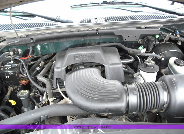 image for item 3279 2003 Ford F150 four door extended cab pickup