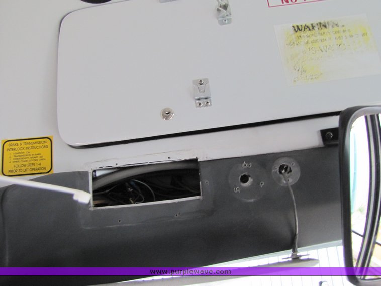 image for item 7358 2004 Ford E450 Super Duty transit bus