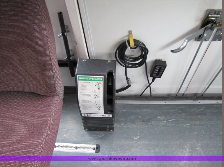 image for item 7358 2004 Ford E450 Super Duty transit bus