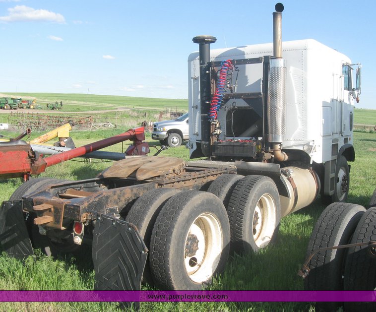 image for item 2054 1987 Freightliner cabover semi truck