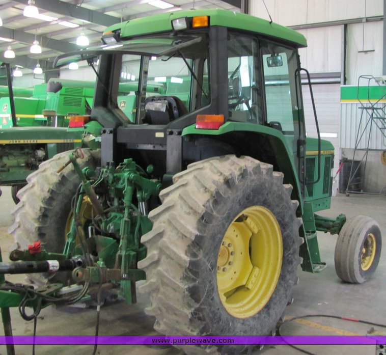 image for item 6046 1997 John Deere 6300 tractor