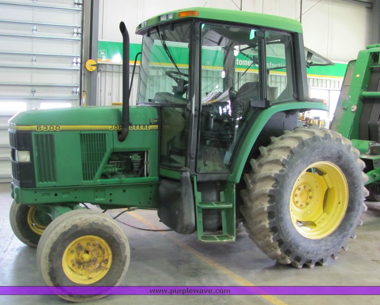 image for item 6046 1997 John Deere 6300 tractor