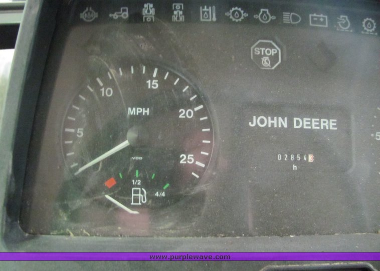 image for item 6046 1997 John Deere 6300 tractor