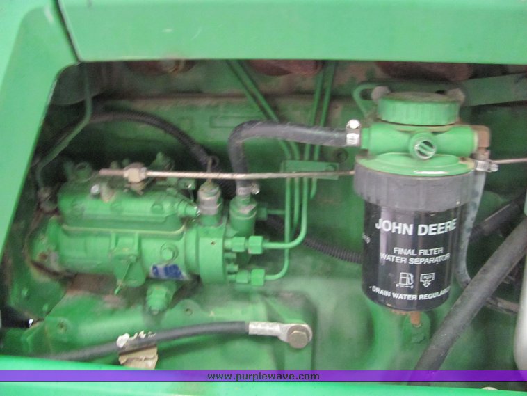 image for item 6046 1997 John Deere 6300 tractor