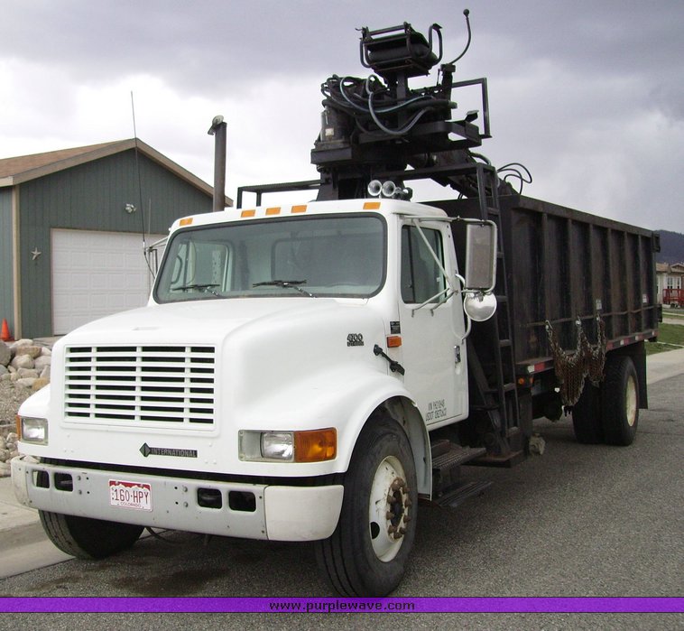 image for item 1031 2000 International 4700 4x2 truck with dump bed