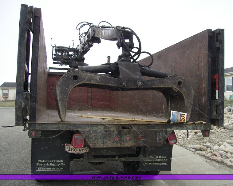 image for item 1031 2000 International 4700 4x2 truck with dump bed