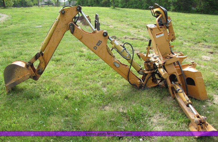 image for item 3100 Case D125 backhoe skid steer attachment