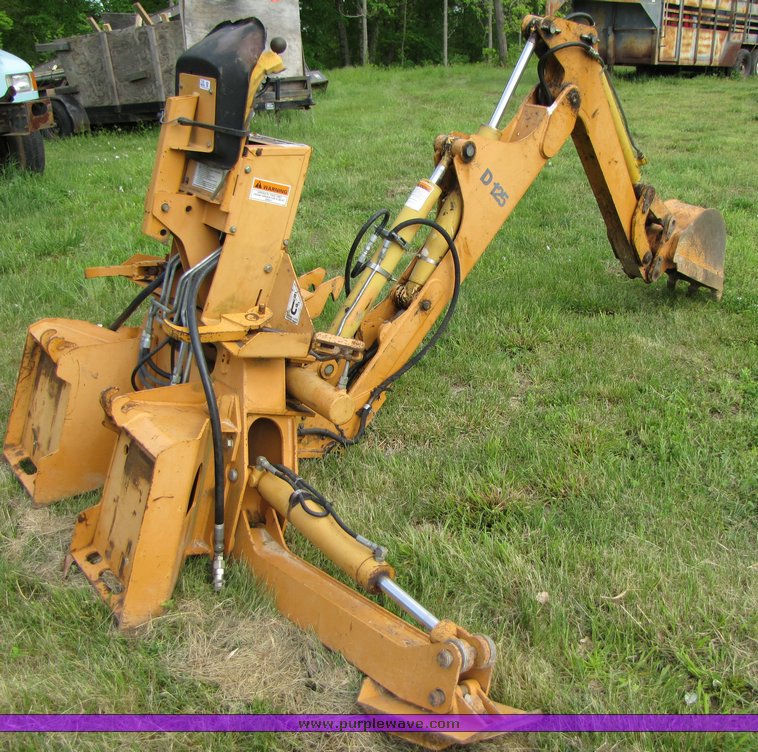 image for item 3100 Case D125 backhoe skid steer attachment