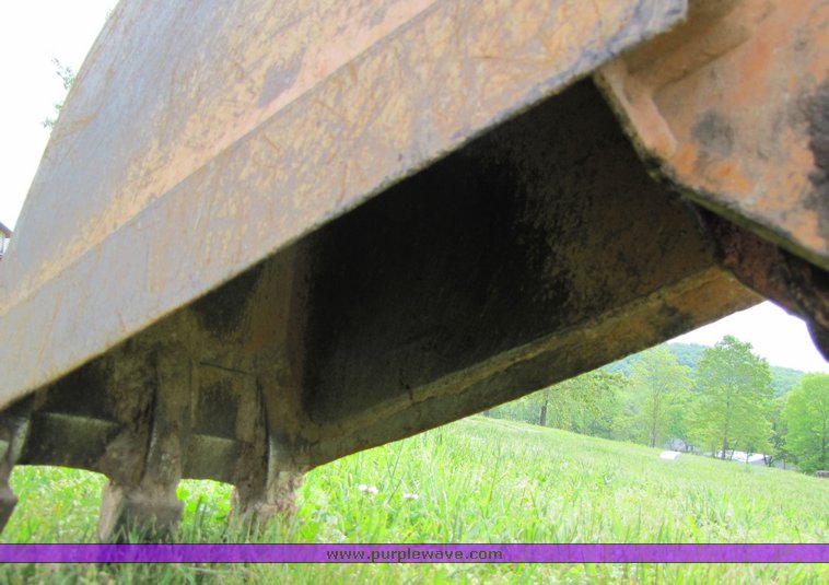 image for item 3100 Case D125 backhoe skid steer attachment