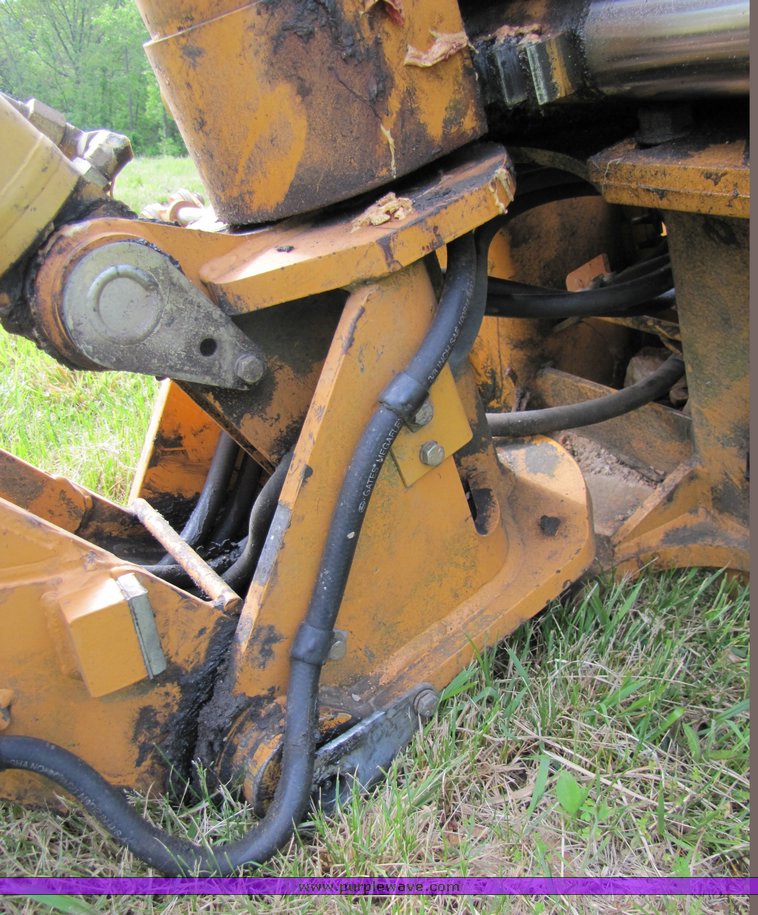 image for item 3100 Case D125 backhoe skid steer attachment