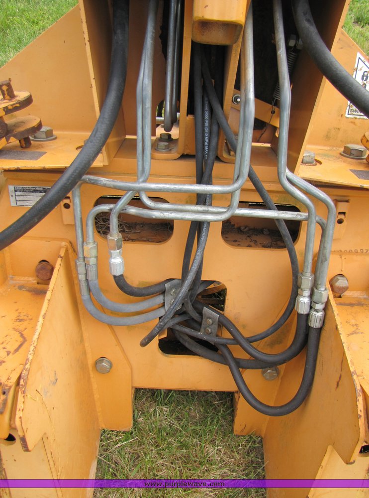 image for item 3100 Case D125 backhoe skid steer attachment