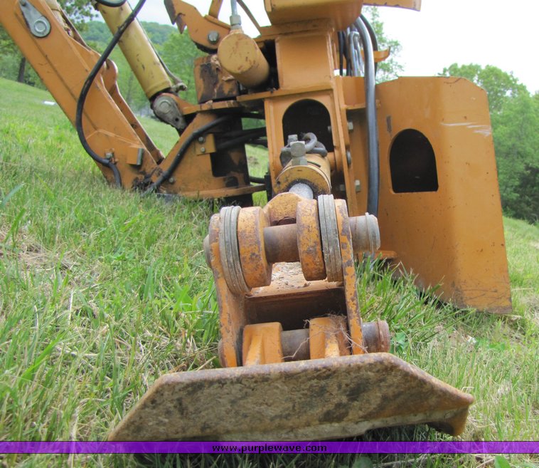 image for item 3100 Case D125 backhoe skid steer attachment
