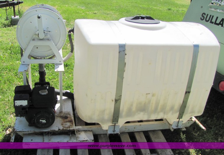 200 gallon water tank with pump in Maitland, MO Item 3238 sold