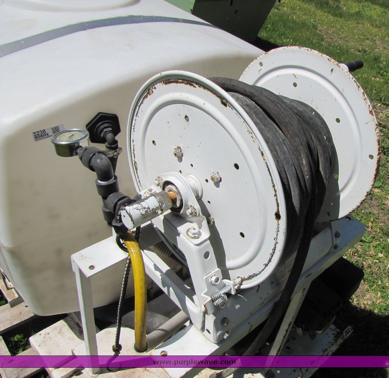 200 gallon water tank with pump in Maitland, MO Item 3238 sold