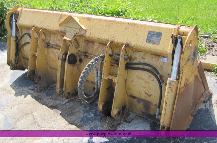 John Deere 4inone bucket for John Deere 310D backhoe in Bolivar, MO