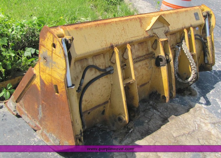 John Deere 4inone bucket for John Deere 310D backhoe in Bolivar, MO Item 3311 sold Purple Wave