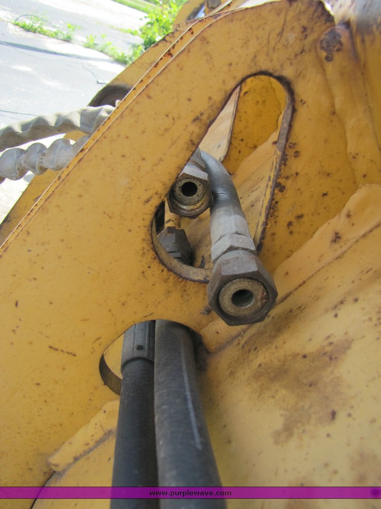 John Deere 4inone bucket for John Deere 310D backhoe in Bolivar, MO