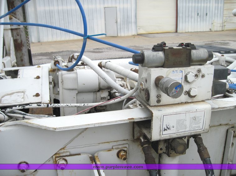 image for item 3932 Mcneilus 11 cubic-yard mixer