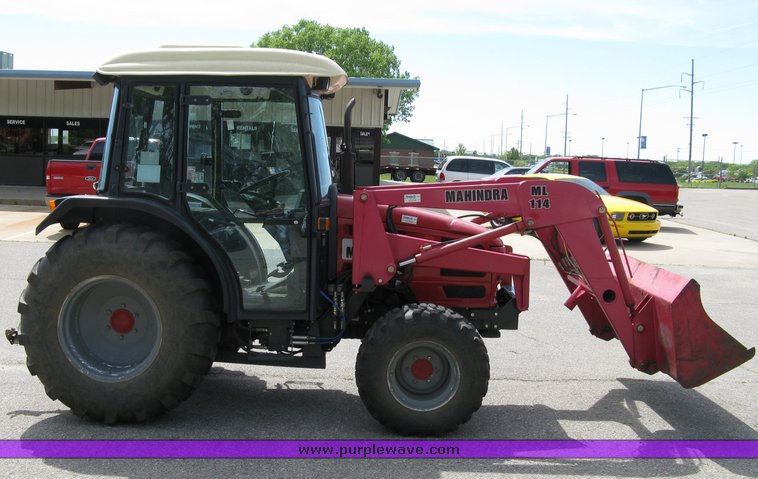 image for item 5004 2004 Mahindra 4510 4WD cab tractor with Mahindra ML114 loader and 6' bucket
