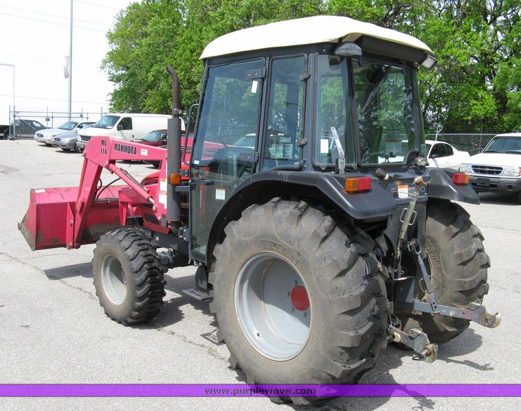 image for item 5004 2004 Mahindra 4510 4WD cab tractor with Mahindra ML114 loader and 6' bucket