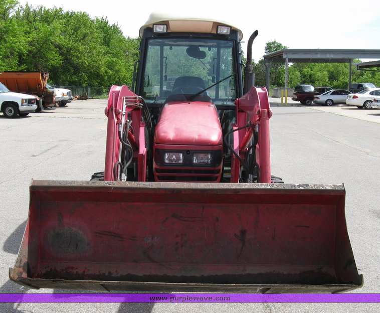 image for item 5004 2004 Mahindra 4510 4WD cab tractor with Mahindra ML114 loader and 6' bucket