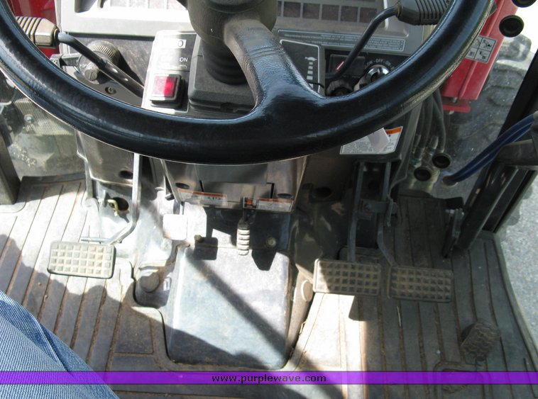 image for item 5004 2004 Mahindra 4510 4WD cab tractor with Mahindra ML114 loader and 6' bucket