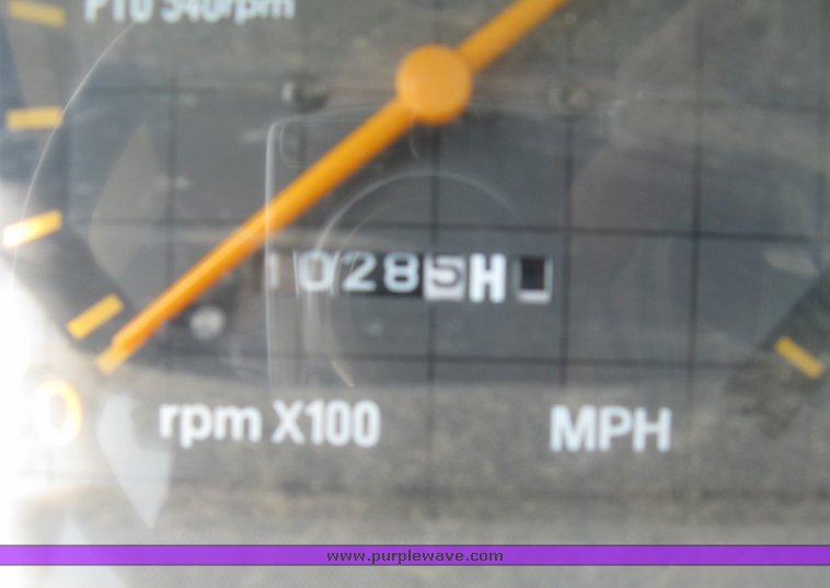 image for item 5004 2004 Mahindra 4510 4WD cab tractor with Mahindra ML114 loader and 6' bucket