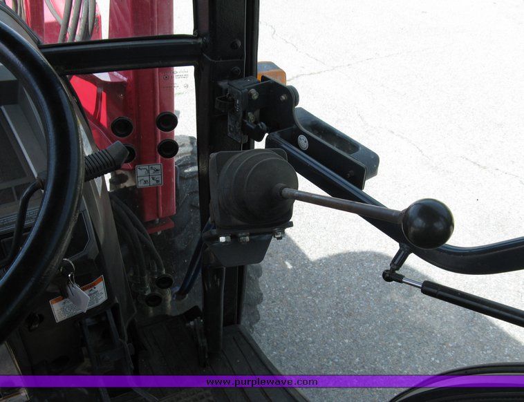 image for item 5004 2004 Mahindra 4510 4WD cab tractor with Mahindra ML114 loader and 6' bucket