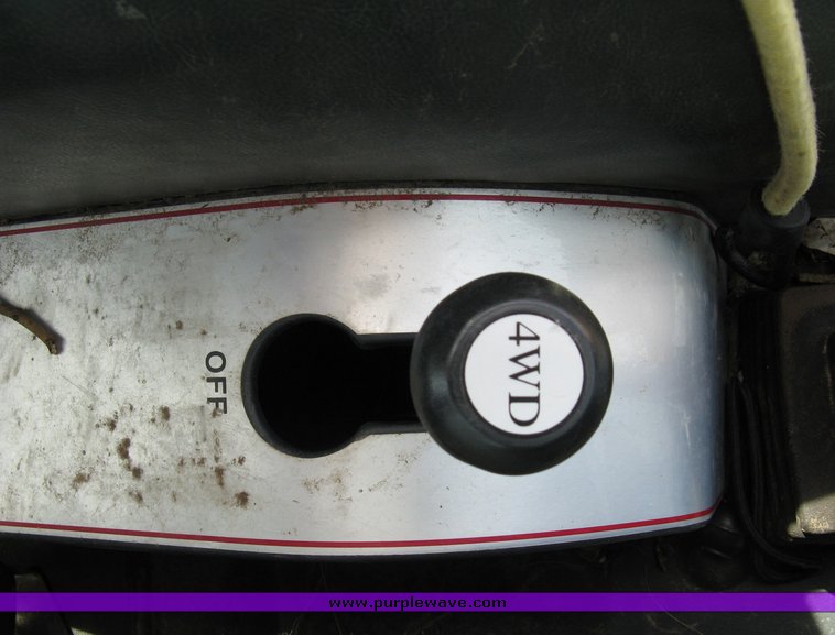 image for item 5004 2004 Mahindra 4510 4WD cab tractor with Mahindra ML114 loader and 6' bucket