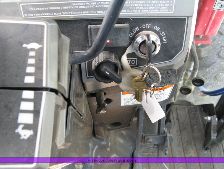 image for item 5004 2004 Mahindra 4510 4WD cab tractor with Mahindra ML114 loader and 6' bucket