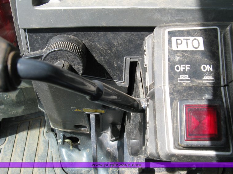 image for item 5004 2004 Mahindra 4510 4WD cab tractor with Mahindra ML114 loader and 6' bucket