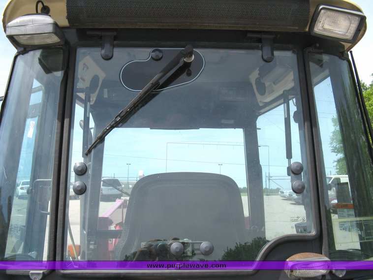 image for item 5004 2004 Mahindra 4510 4WD cab tractor with Mahindra ML114 loader and 6' bucket