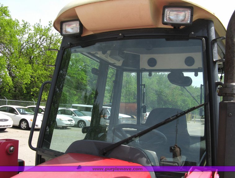 image for item 5004 2004 Mahindra 4510 4WD cab tractor with Mahindra ML114 loader and 6' bucket