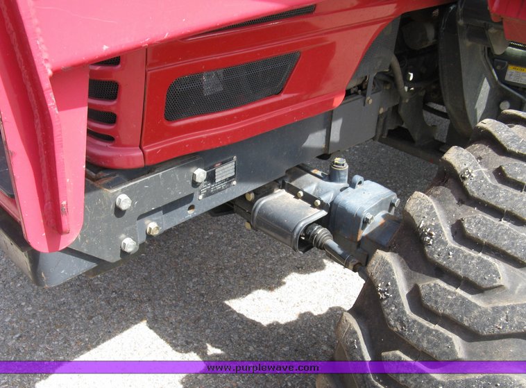 image for item 5004 2004 Mahindra 4510 4WD cab tractor with Mahindra ML114 loader and 6' bucket