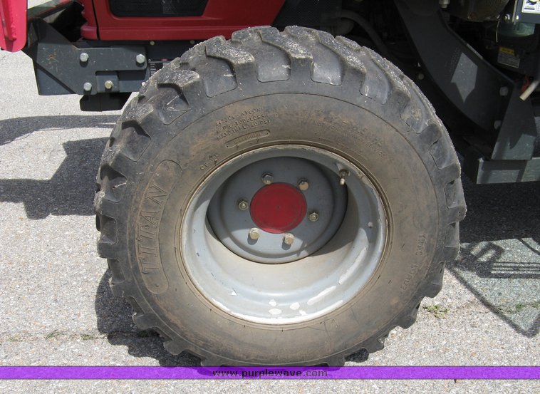 image for item 5004 2004 Mahindra 4510 4WD cab tractor with Mahindra ML114 loader and 6' bucket