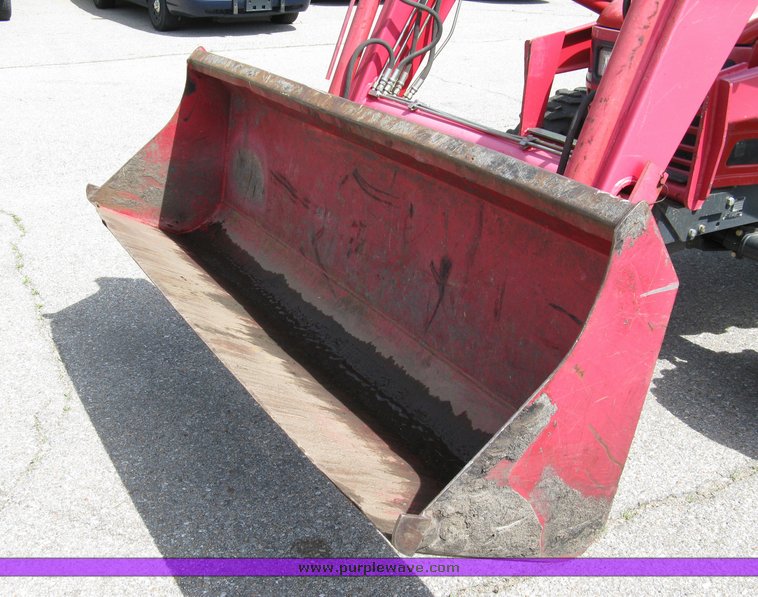 image for item 5004 2004 Mahindra 4510 4WD cab tractor with Mahindra ML114 loader and 6' bucket