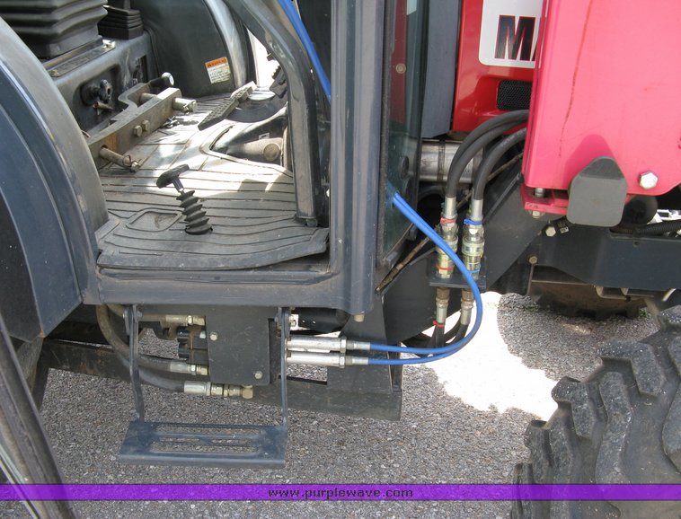 image for item 5004 2004 Mahindra 4510 4WD cab tractor with Mahindra ML114 loader and 6' bucket