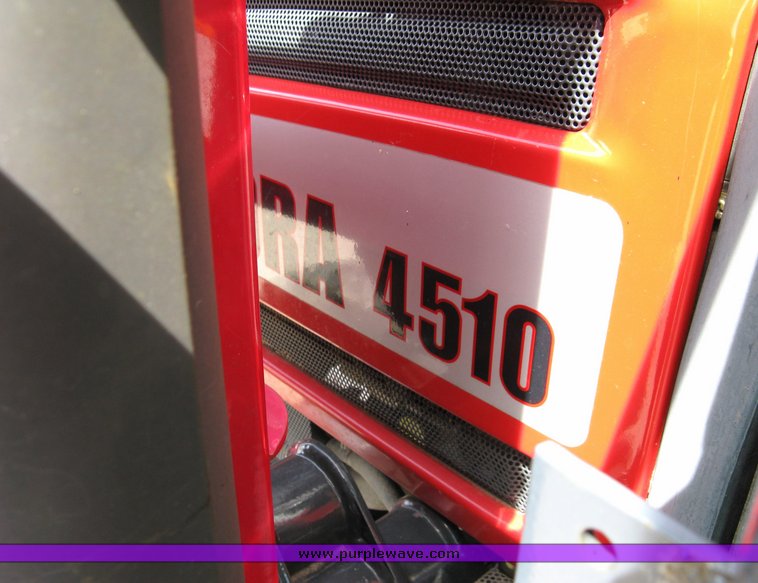 image for item 5004 2004 Mahindra 4510 4WD cab tractor with Mahindra ML114 loader and 6' bucket