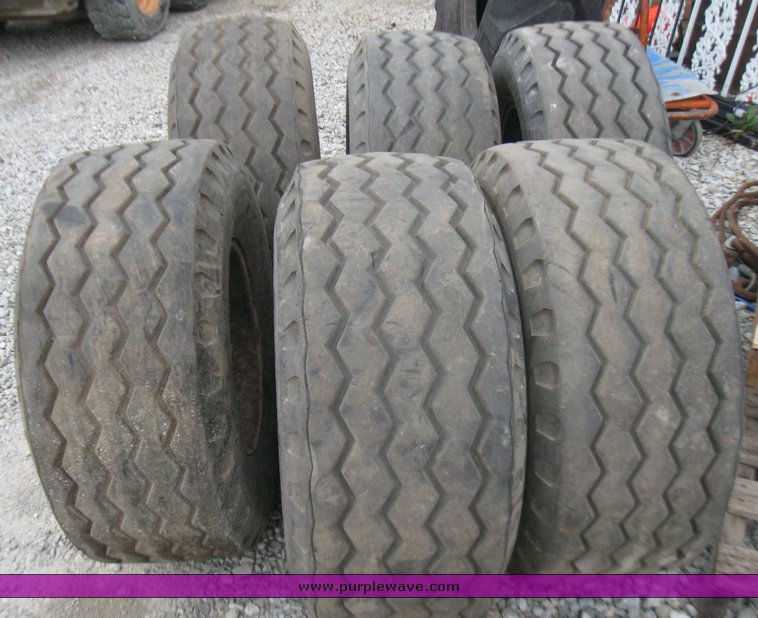 image for item 7355 (6) 14.5/75-16 tires on 8 hole rims