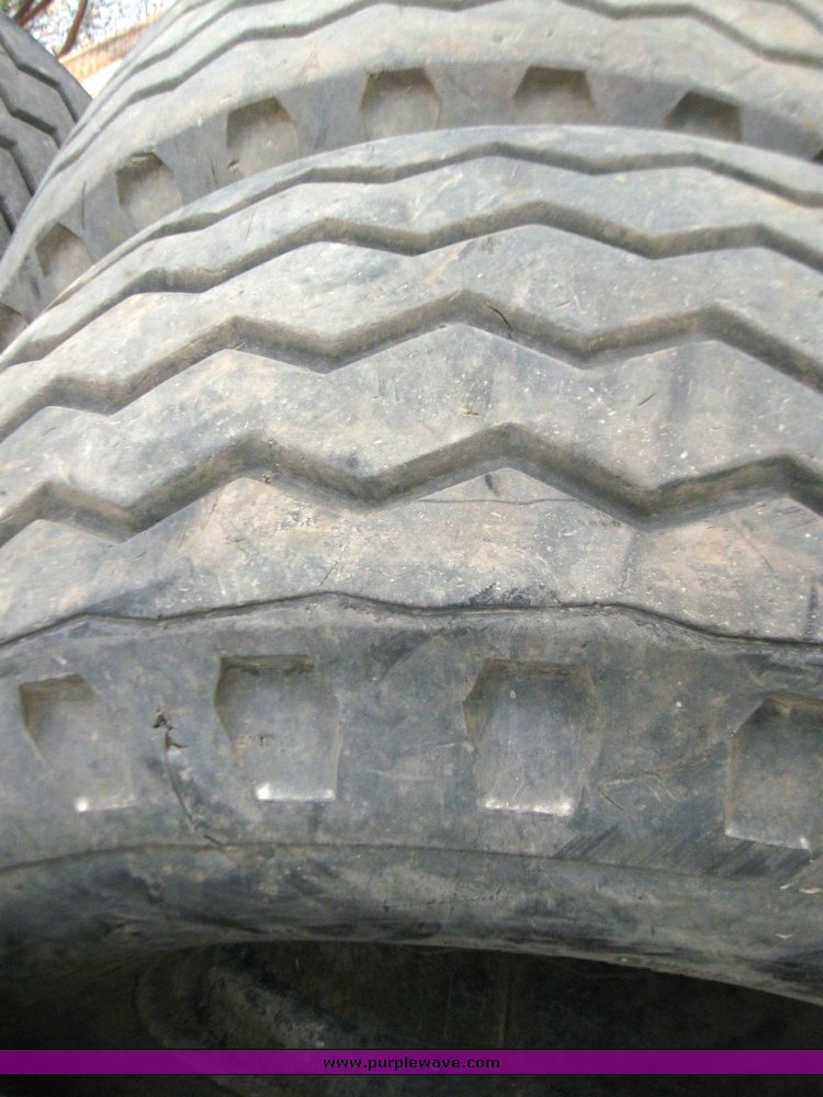 image for item 7355 (6) 14.5/75-16 tires on 8 hole rims