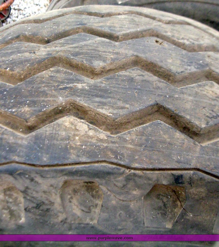 image for item 7355 (6) 14.5/75-16 tires on 8 hole rims