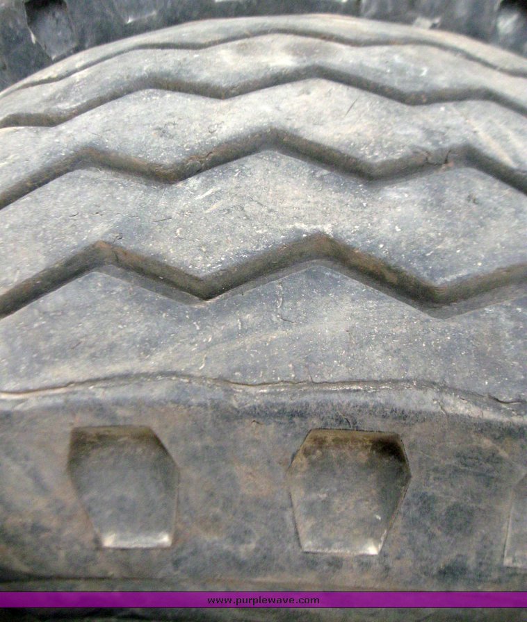 image for item 7355 (6) 14.5/75-16 tires on 8 hole rims