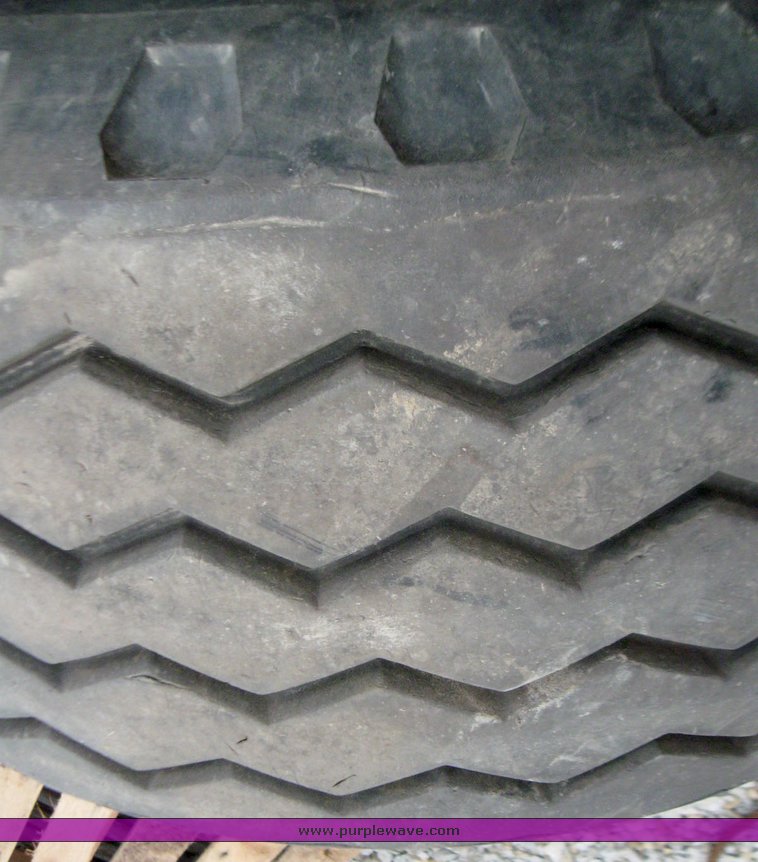 image for item 7355 (6) 14.5/75-16 tires on 8 hole rims