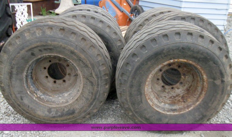 image for item 7355 (6) 14.5/75-16 tires on 8 hole rims