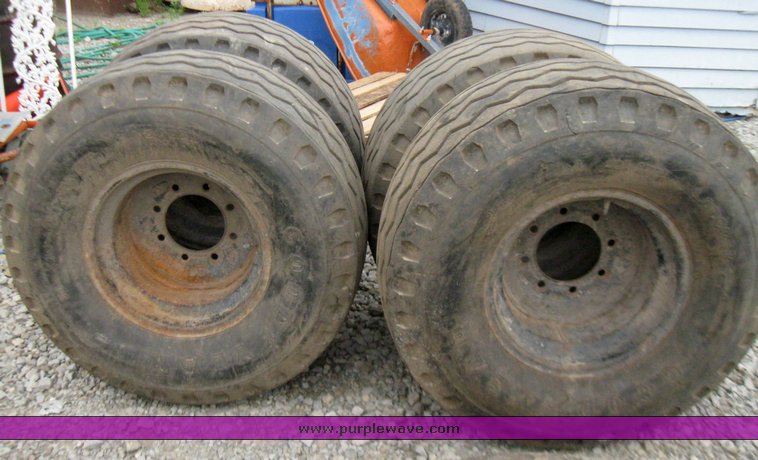 image for item 7355 (6) 14.5/75-16 tires on 8 hole rims