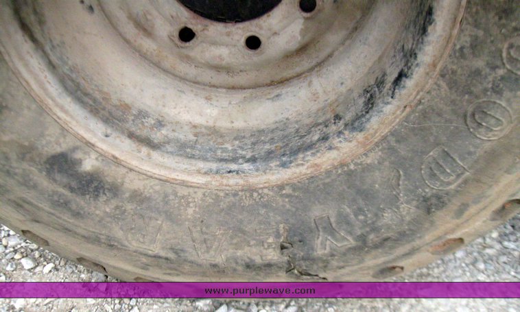 image for item 7355 (6) 14.5/75-16 tires on 8 hole rims