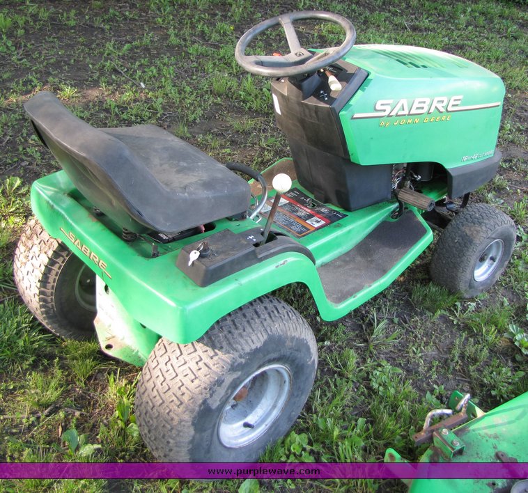 1995 John Deere Sabre lawn tractor with mower attachment in